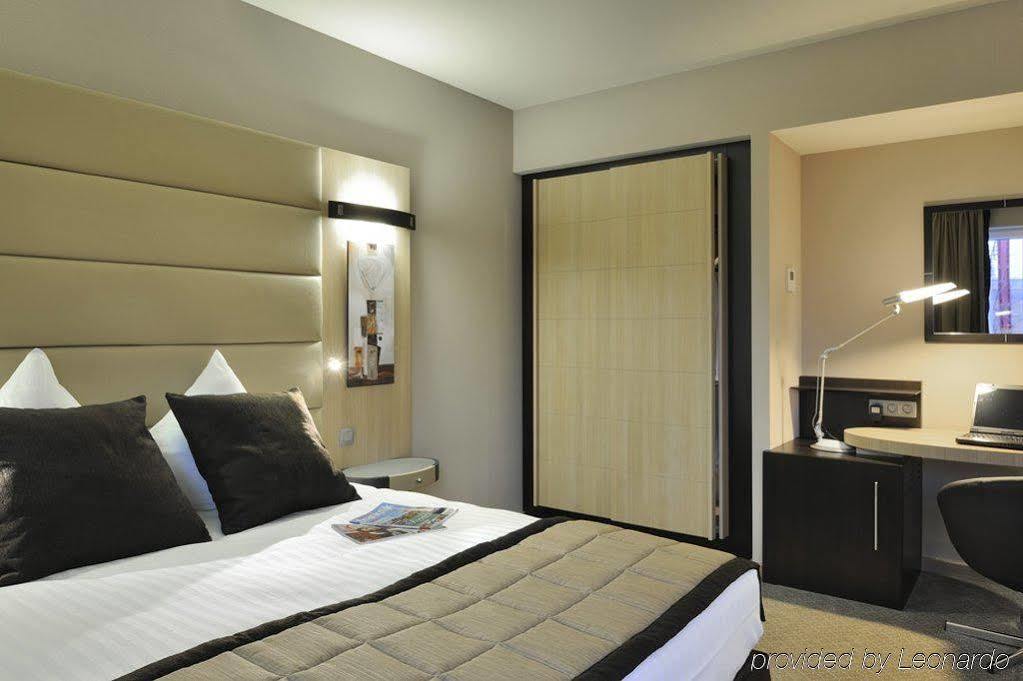 Hotel Novotel Centre Midi 4*