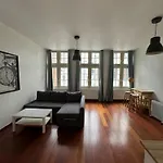 Elegant Grand Place Stays